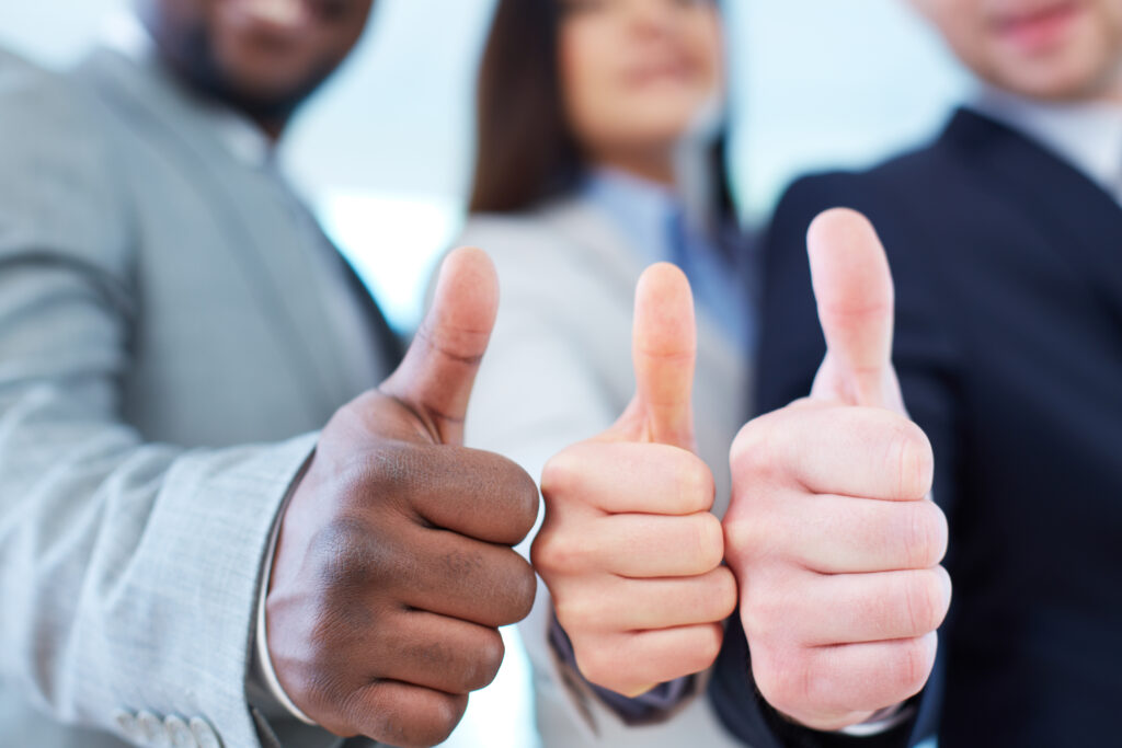 showing thumbs up